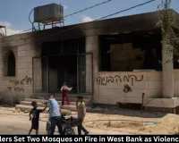 Israeli Settlers Set Two Mosques on Fire in West Bank Amid Rising Violence