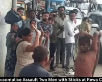 Rewa Viral : Woman Assaults Two Men with Sticks at Sirmour Chowk, Police Launch Probe